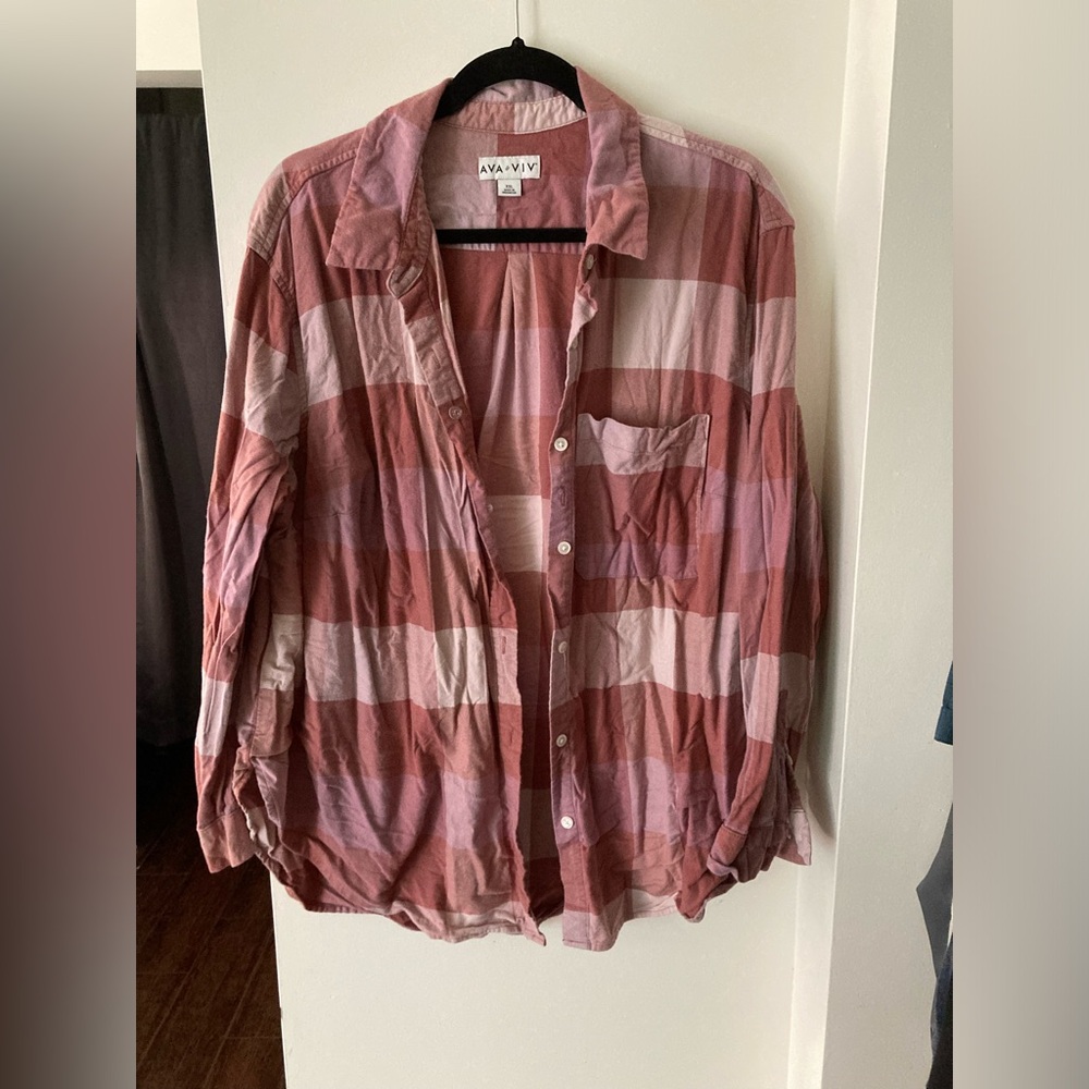Woman’s plaid button up